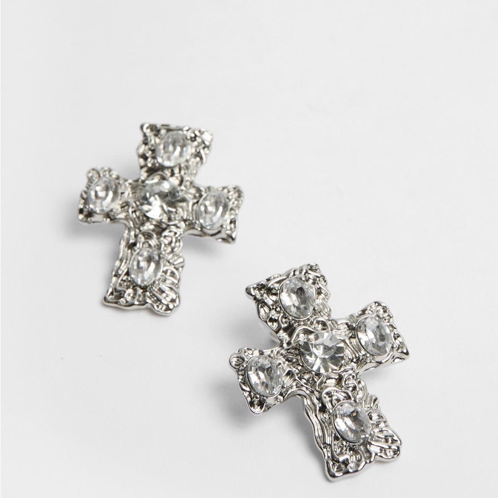 Brand new, never worn, silver cross statement earrings.